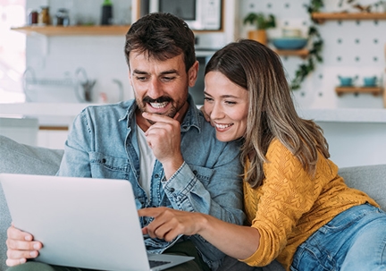 Couple using computer